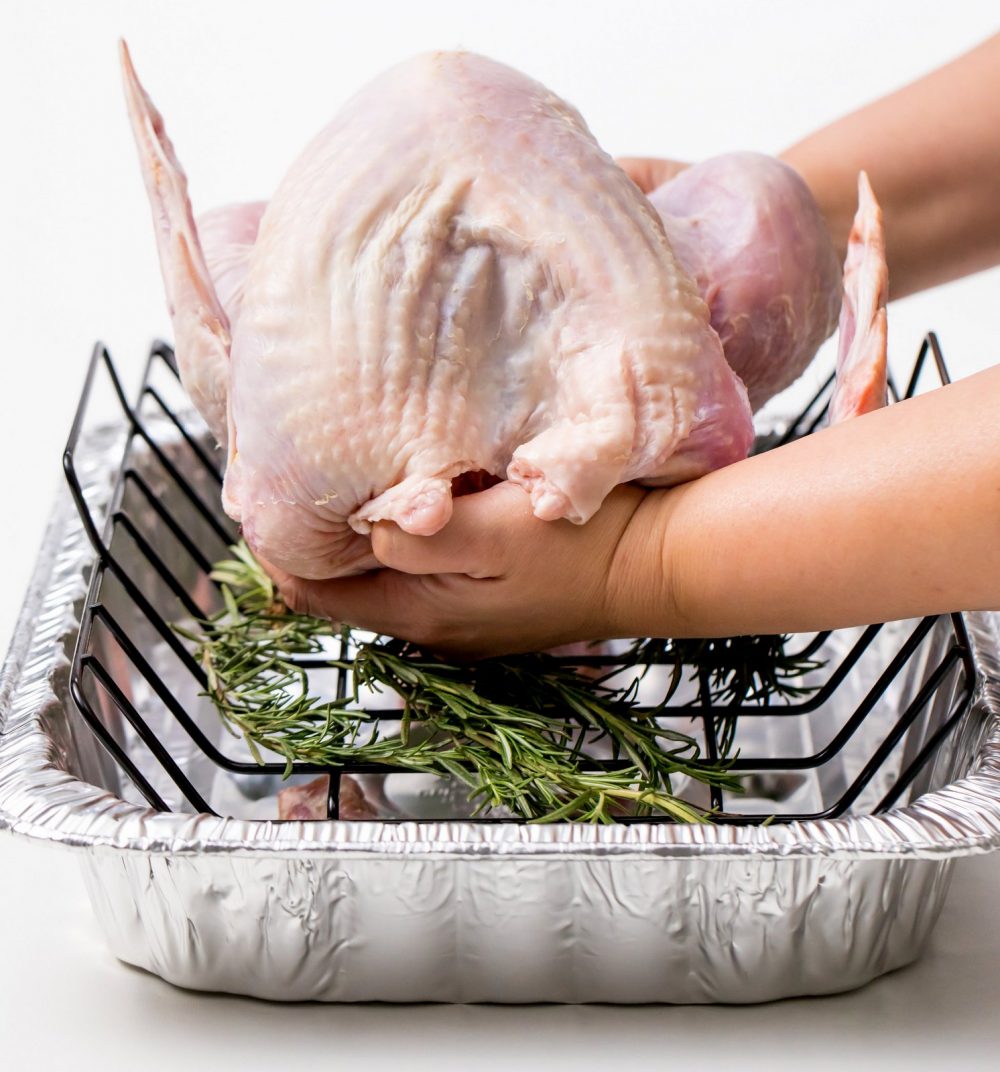 Grilled-Turkey-w-Rosemary-butter-in-metal-roasting-pan