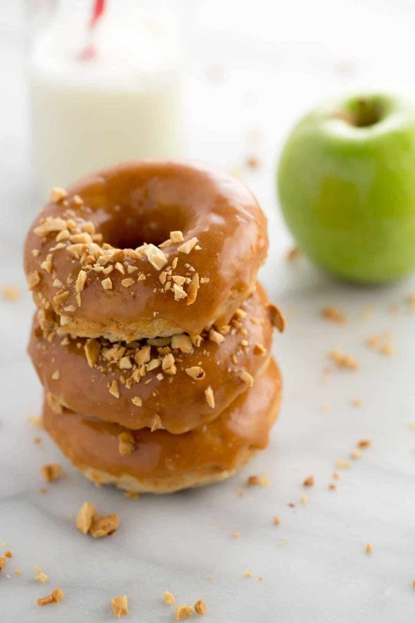 baked-caramel-apple-donuts-with-crushed-peanuts-600x900