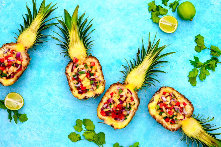 Pineapple salsa served in a pineapple shells