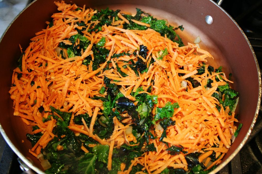sweet potato and kale in a pan
