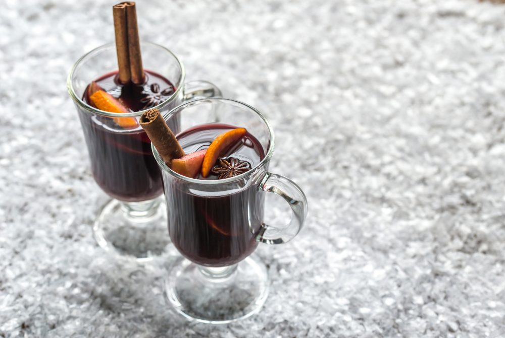 Glasses of mulled wine in snow