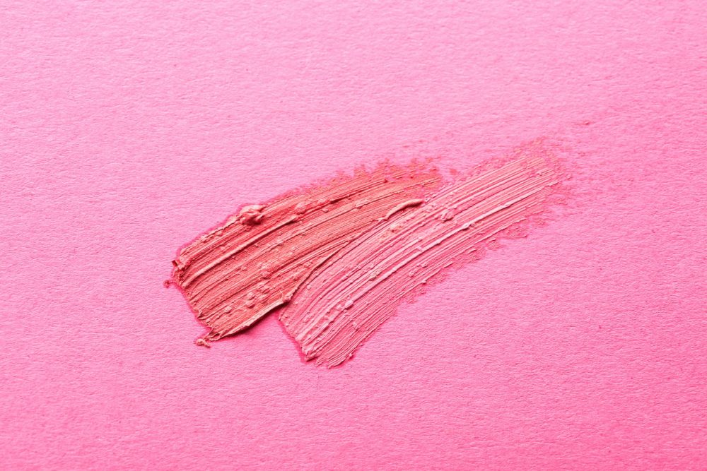 lipstick smear on pink background