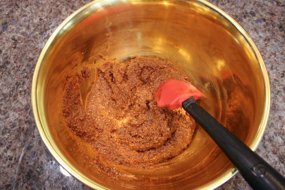 chocolate oat crust in copper bowl