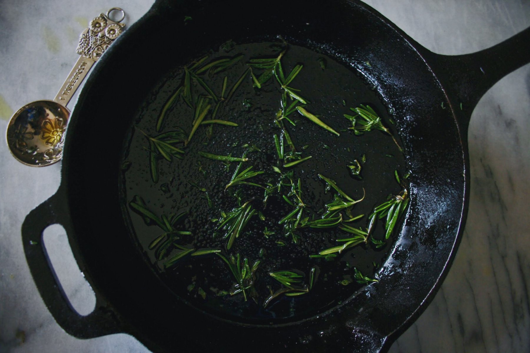 herbs in a skillet