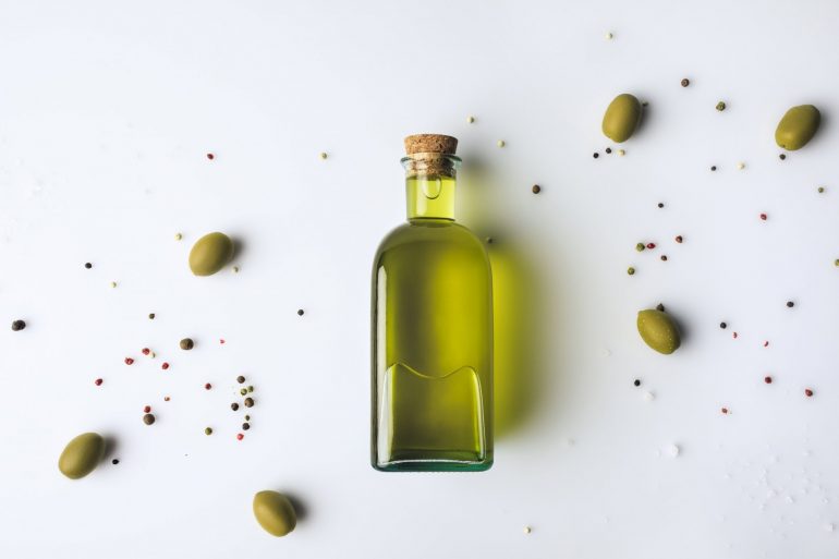 olive oil flat lay fi