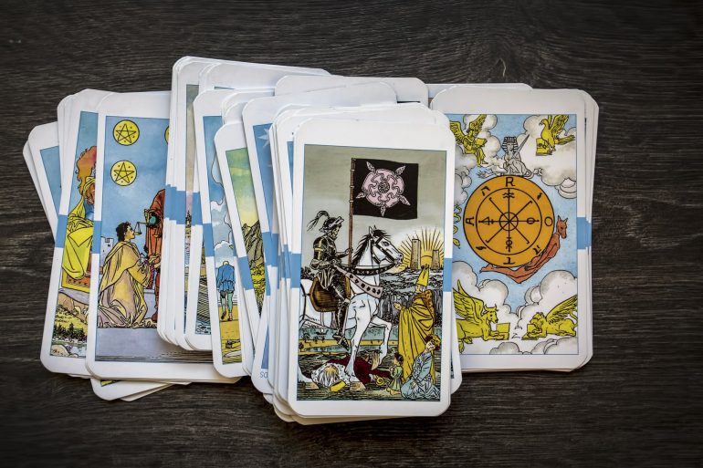 tarot cards on wooden background